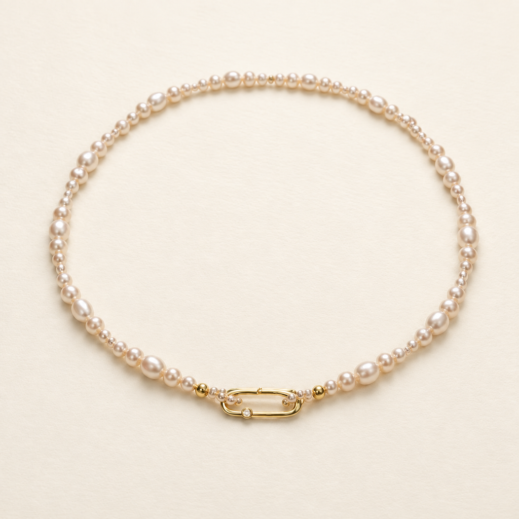 Chiara Classic Pearl Necklace on warm ivory-beige background